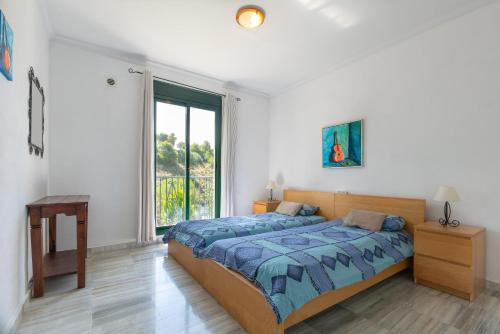 Posteľ alebo postele v izbe v ubytovaní Apartment Alhaurín Golf