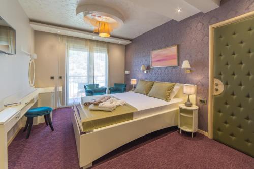 Un pat sau paturi într-o cameră la Villa Katarina