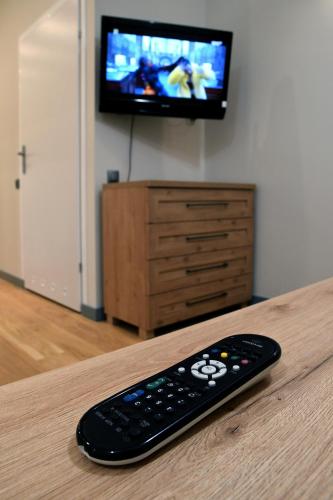 APARTAMENT KOTLINKAにあるテレビまたはエンターテインメントセンター
