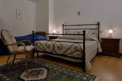 Ένα ή περισσότερα κρεβάτια σε δωμάτιο στο La Casa di Gloria - Residence affitta camere