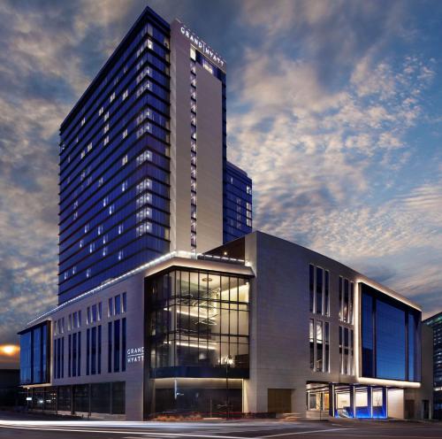 a tall building with a building at Grand Hyatt Nashville in Nashville