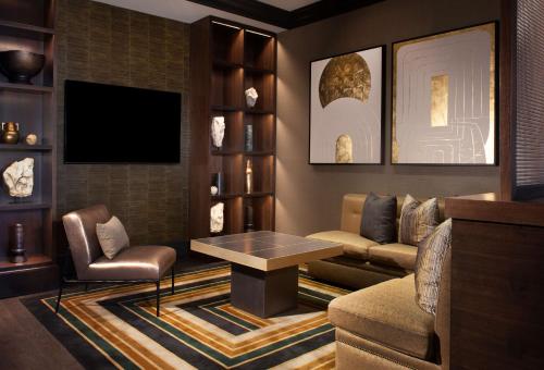 a living room with a couch and a table at Grand Hyatt Nashville in Nashville