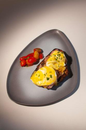 a plate of food with eggs and vegetables on it at Grand Hyatt Nashville in Nashville