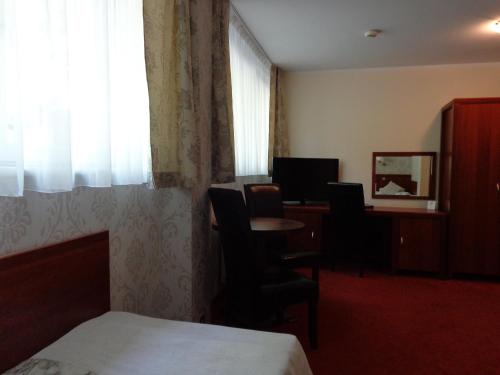 Postel nebo postele na pokoji v ubytování Mazowsze Medi Spa