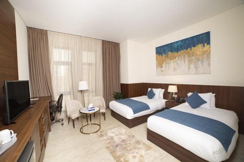 Postel nebo postele na pokoji v ubytování Silotel - Boutique Hotel , Sadat City