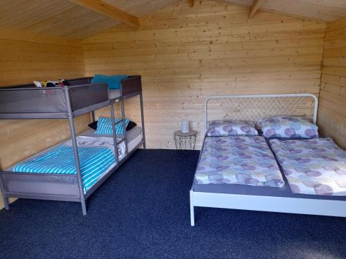 Postel nebo postele na pokoji v ubytování Camping Weides