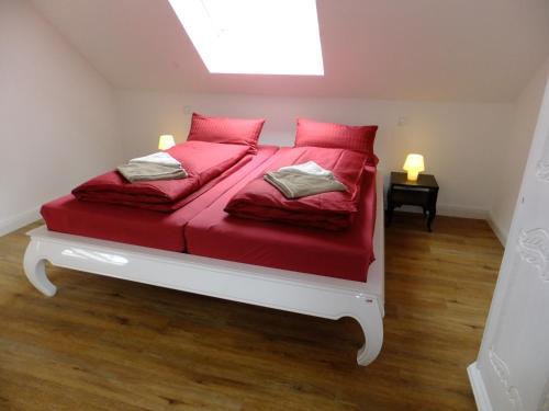 Ένα ή περισσότερα κρεβάτια σε δωμάτιο στο LakeStarnberg Apartments