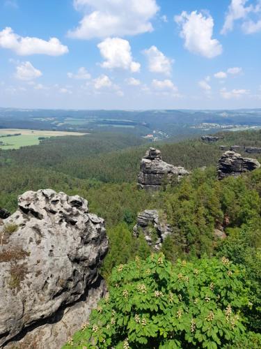 a view from the top of a rock formation at FeWo Bockmühle in Hohnstein