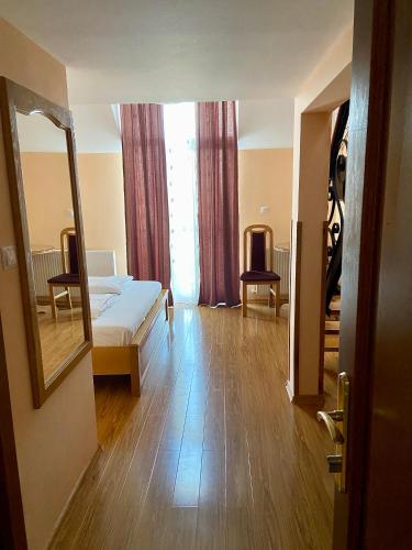 Ένα ή περισσότερα κρεβάτια σε δωμάτιο στο Casa Irlandeza - Irish House
