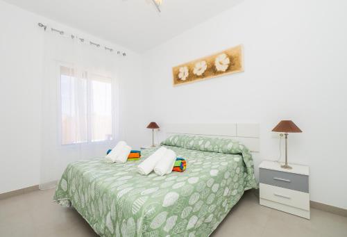 Posteľ alebo postele v izbe v ubytovaní Cubo's Villa Pilar