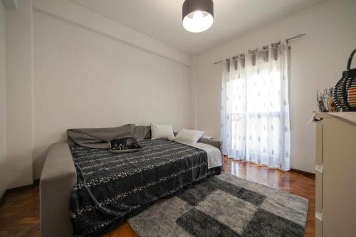 Postel nebo postele na pokoji v ubytování Alugabem Apartment Oporto