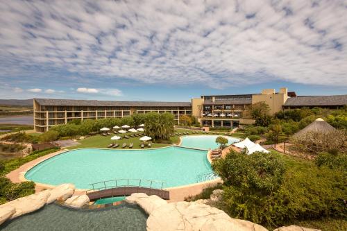 an overhead view of a swimming pool at a resort at Arabella Hotel, Golf and Spa in Kleinmond