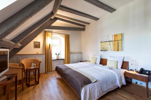 Postel nebo postele na pokoji v ubytování Hotel de Charme Römerhof