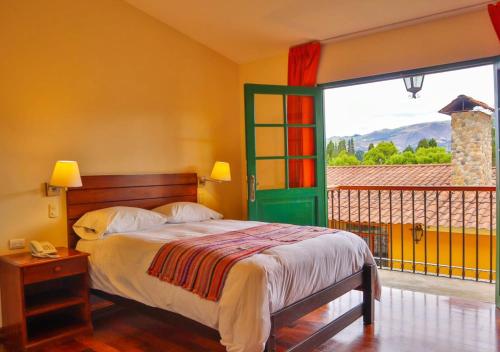 Кровать или кровати в номере Hotel Tartar