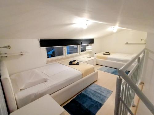 Posteľ alebo postele v izbe v ubytovaní Apartments Villa Marid
