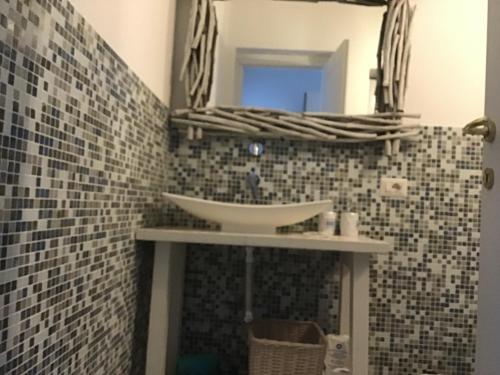 ห้องน้ำของ Luxury& Charme fronte mare Sardinia House7