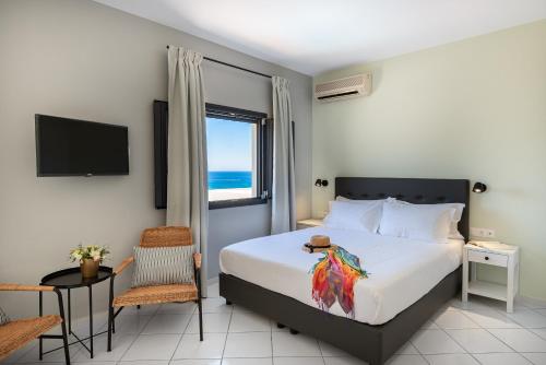 Postel nebo postele na pokoji v ubytování Minois Boutique Hotel