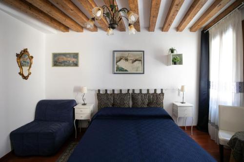 Postel nebo postele na pokoji v ubytování Hidden Gem in Venice