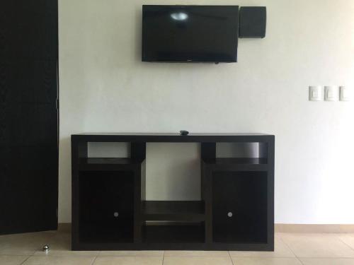 TV/Unterhaltungsangebot in der Unterkunft Zenharmony Suites