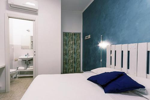 Ένα ή περισσότερα κρεβάτια σε δωμάτιο στο Al Borgo Marinaro Guest House