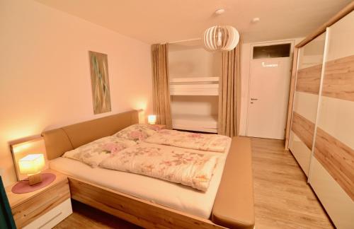 מיטה או מיטות בחדר ב-Apartment Almrock