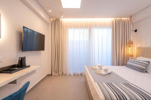 Katil atau katil-katil dalam bilik di Mirablue Luxury Residences