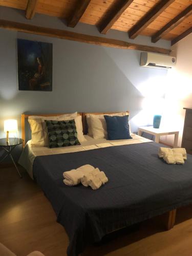 En eller flere senge i et værelse på Casa D'arte2