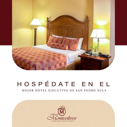 a hotel room with a bed and a nightstand with two lamps at Hotel Monteolivos in San Pedro Sula