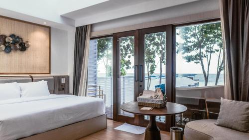 Postel nebo postele na pokoji v ubytování Arasatu Villas & Sanctuary