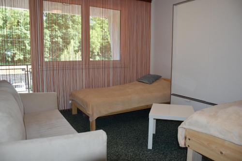 Posteľ alebo postele v izbe v ubytovaní AB Apartman Siófok