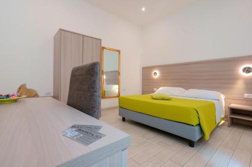 Ένα ή περισσότερα κρεβάτια σε δωμάτιο στο Bardilio Luxury Rooms