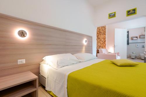 Ένα ή περισσότερα κρεβάτια σε δωμάτιο στο Bardilio Luxury Rooms