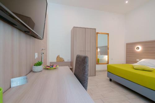Ένα ή περισσότερα κρεβάτια σε δωμάτιο στο Bardilio Luxury Rooms