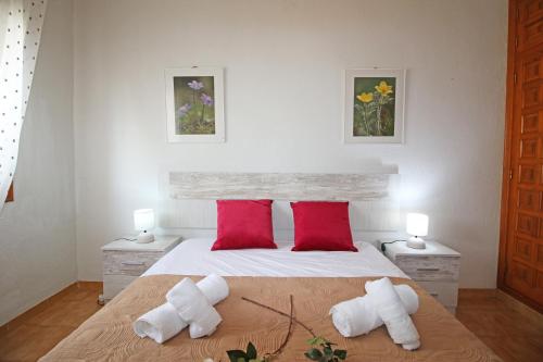 A bed or beds in a room at Residencial Tropicana