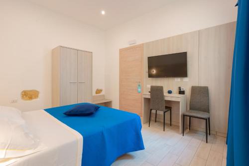 Μια τηλεόραση ή/και κέντρο ψυχαγωγίας στο Bardilio Luxury Rooms