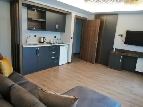 Η κουζίνα ή μικρή κουζίνα στο Ferah Suites Hotel