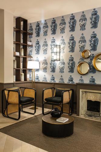 a room with blue and white plates on the wall at Hotel Porta San Mamolo in Bologna