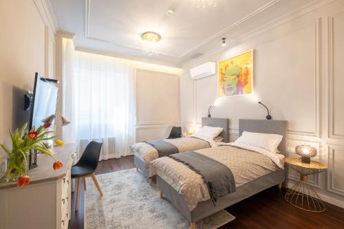 Postelja oz. postelje v sobi nastanitve Premium Apartments - Top-Notch Place 2BR/2BTH