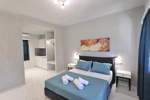 Ένα ή περισσότερα κρεβάτια σε δωμάτιο στο Elizabeth Studios