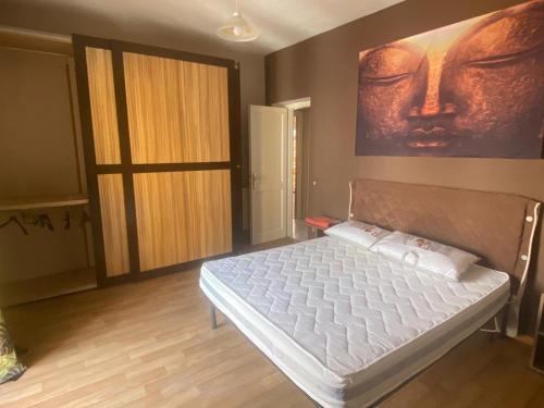 Ένα ή περισσότερα κρεβάτια σε δωμάτιο στο Gerani Quadrilocale