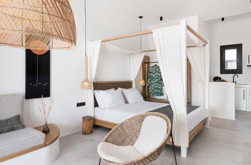 Ένα ή περισσότερα κρεβάτια σε δωμάτιο στο Athina Milos Suites