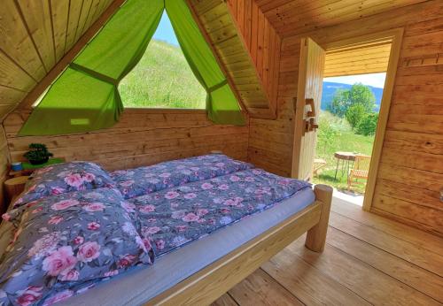 Postelja oz. postelje v sobi nastanitve Glamping Brodej