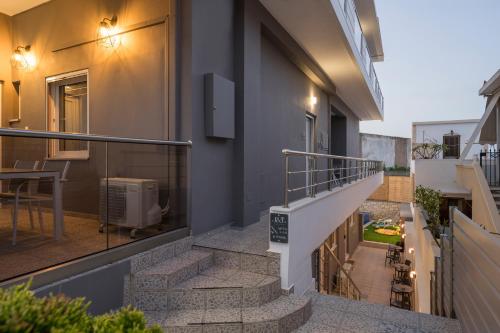 a view from the balcony of a building with stairs at JT Apartments in Kissamos