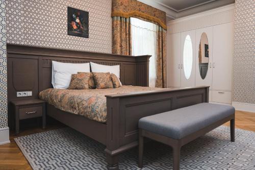 Ένα ή περισσότερα κρεβάτια σε δωμάτιο στο Roze Boutique Hotel