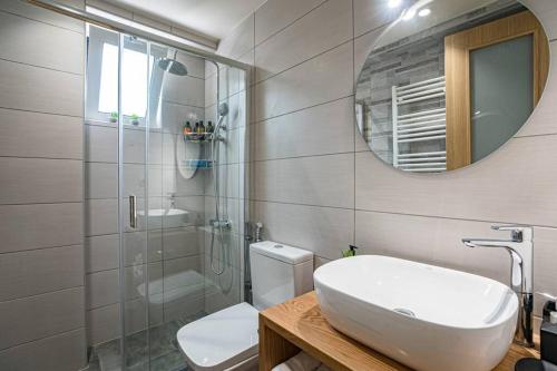 A bathroom at Olga's Organic garden Home for a couple! with Wifi & AC