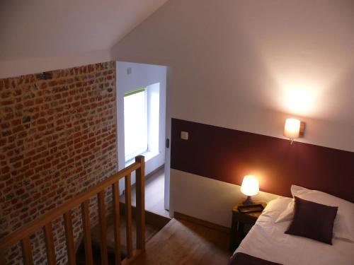 Postel nebo postele na pokoji v ubytování Gîte La Malavisée