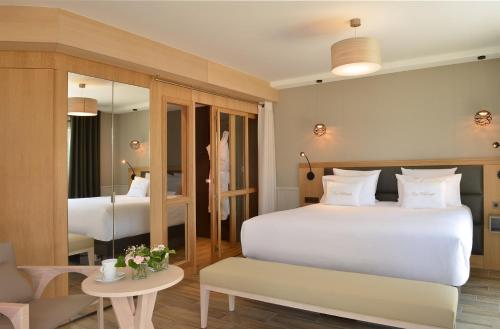 Katil atau katil-katil dalam bilik di Hotel Les Vikings