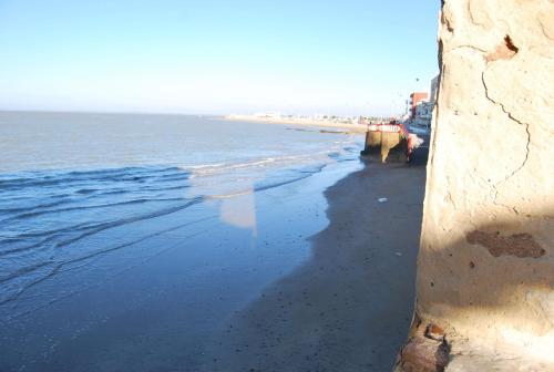 a view of the beach from a wall at Hostal Avenida by Bossh! Hotels in Chipiona
