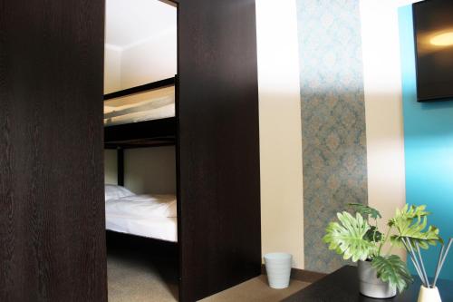 Letto o letti in una camera di besttime Hotel Bendorf Koblenz