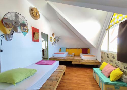 Postel nebo postele na pokoji v ubytování Ô PasSage - Kaz Auberge